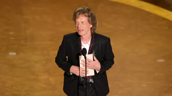 Mick Jagger jokes Bob Dylan turned Oscars down as he presents award