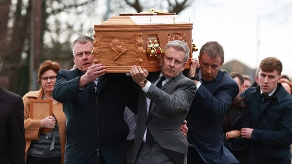 Patrick Kielty carries mother's coffin as mourners gather for funeral